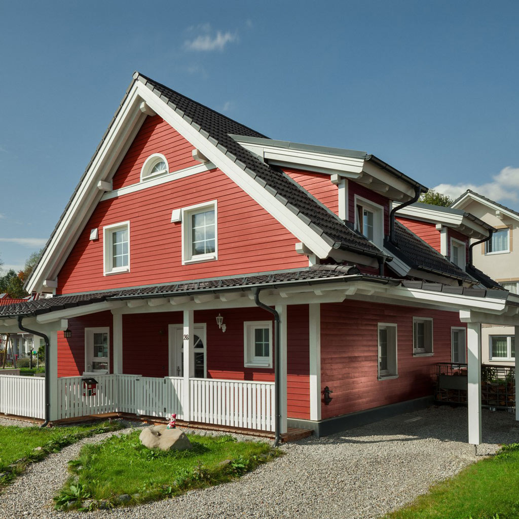 nachhaltig Holzhaus verkleidet rot